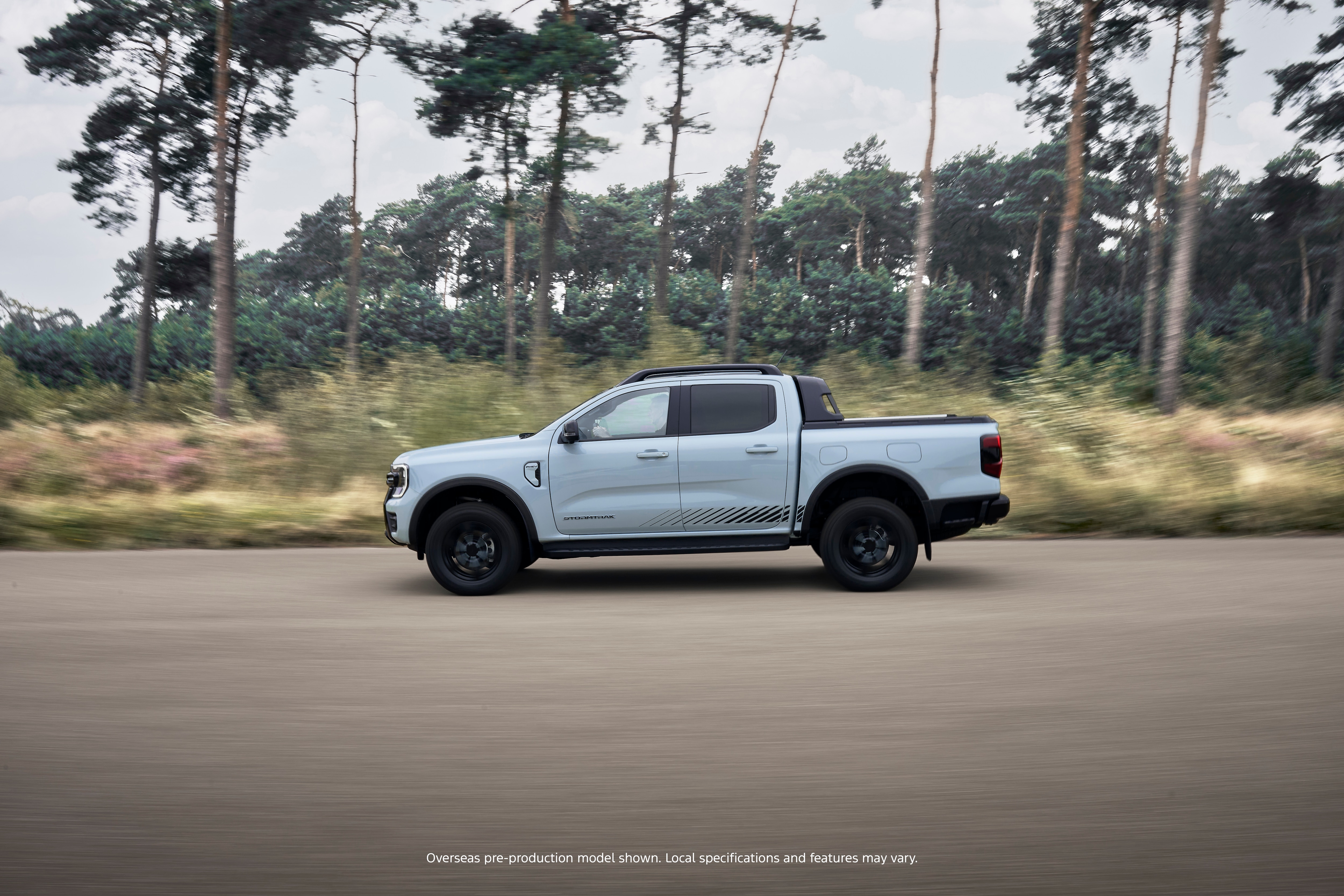 Ranger PHEV. Overseas pre-production model shown. Local specifications and features may vary.