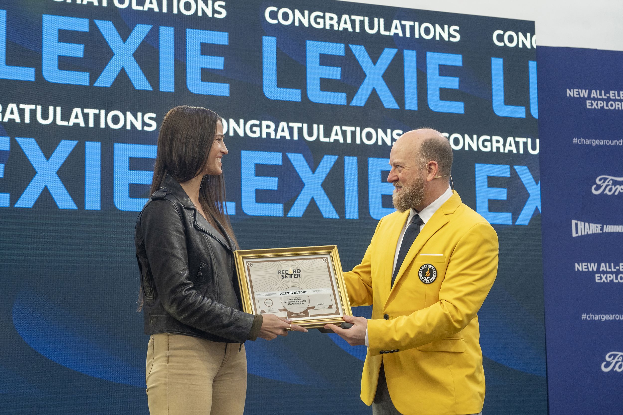 Nice, France: Lexie Alford (@LexieLimitless) receives official recognition from RecordSetter for being the first person to circumnavigate the globe in an electric vehicle, using the new all-electric Ford Explorer LICENSE EXPIRES: 2027-03-26 - LICENSE BY: Ford Europe LICENSE SCOPE: A - Earned editorial, press releases, press kits. B - All non-broadcast digital and online media. C - All non-broadcast digital and online media, plus Retail and POS (showrooms, events etc). D - All print media (newspaper, magazine etc) REGION: Europe COPYRIGHT AND IMAGE RIGHTS: This content is solely for editorial use and for providing individual users with information. Any storage in databases, or any distribution to third parties within the scope of commercial use, or for commercial use is permitted with written consent from Ford of Europe only.