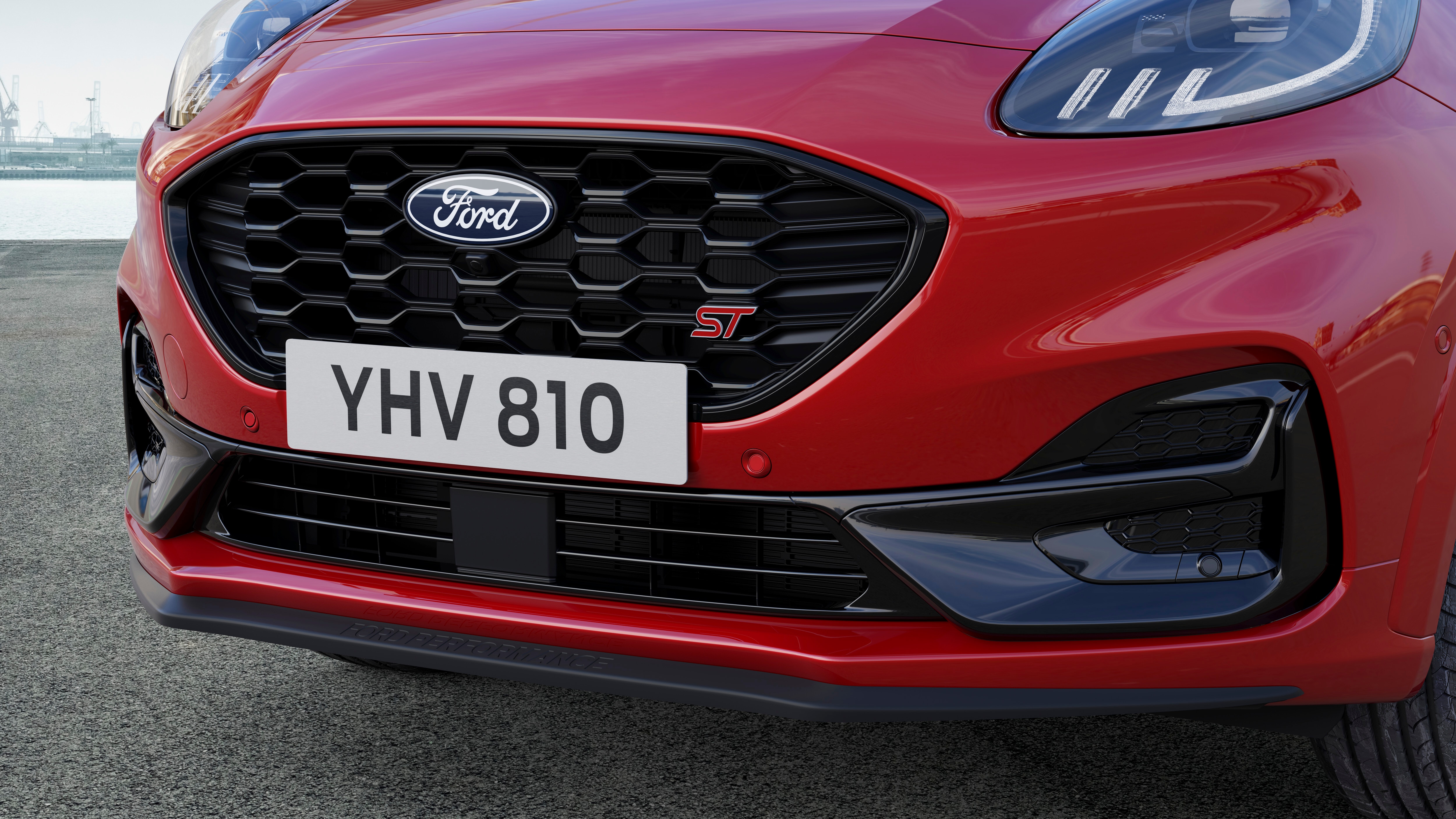 front grill of red car