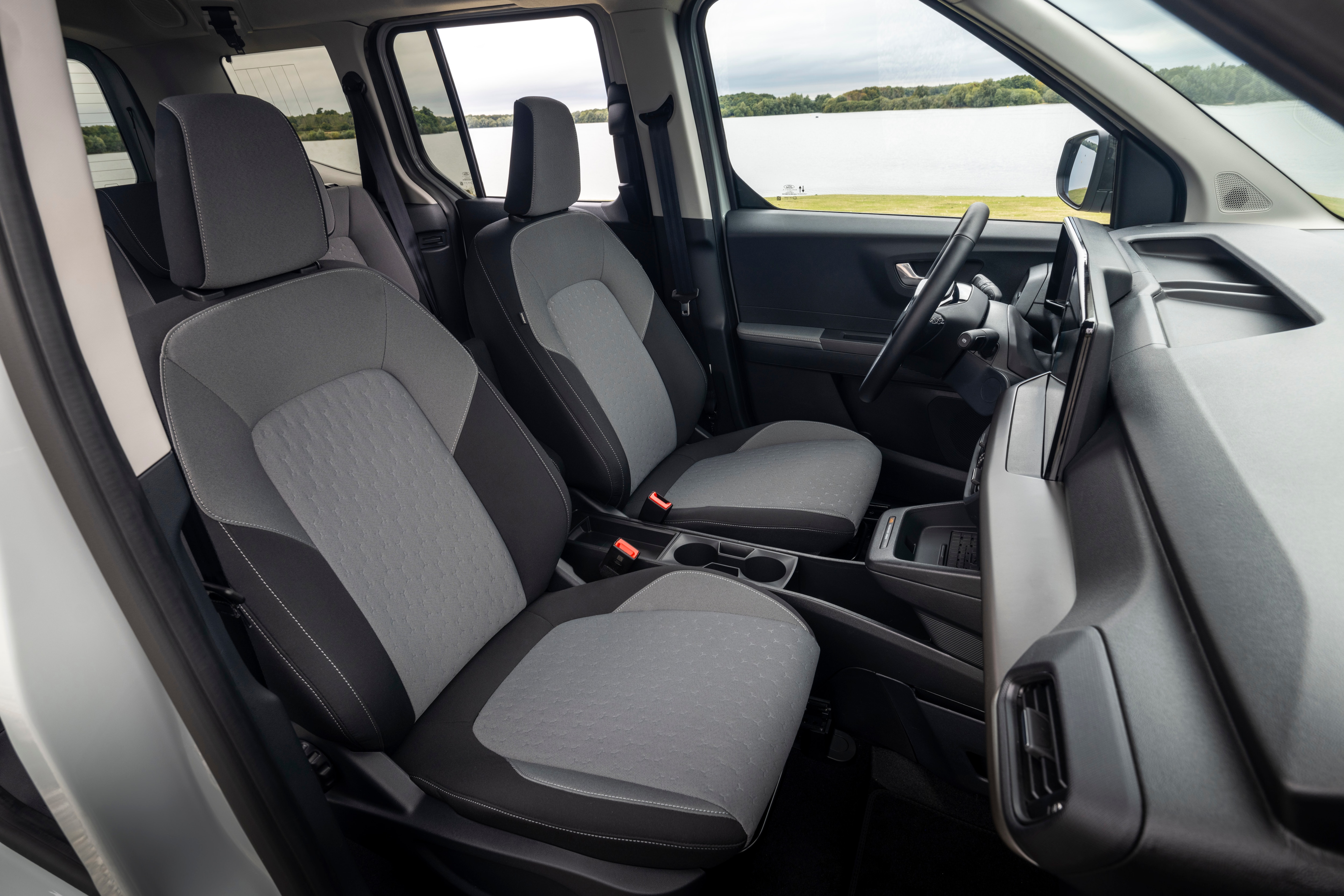 Stylish, Spacious E-Tourneo Courier Expands Electric Vehicle Roll Out. LICENSE EXPIRES: 8th October 2027 - LICENSE BY: Stuart Price LICENSE SCOPE: A - Earned editorial, press releases, press kits. B - All non-broadcast digital and online media. C - All non-broadcast digital and online media, plus Retail and POS (showrooms, events etc). D - All print media (newspaper, magazine etc) REGION: Europe COPYRIGHT AND IMAGE RIGHTS: This content is solely for editorial use and for providing individual users with information. Any storage in databases, or any distribution to third parties within the scope of commercial use, or for commercial use is permitted with written consent from Ford of Europe only.