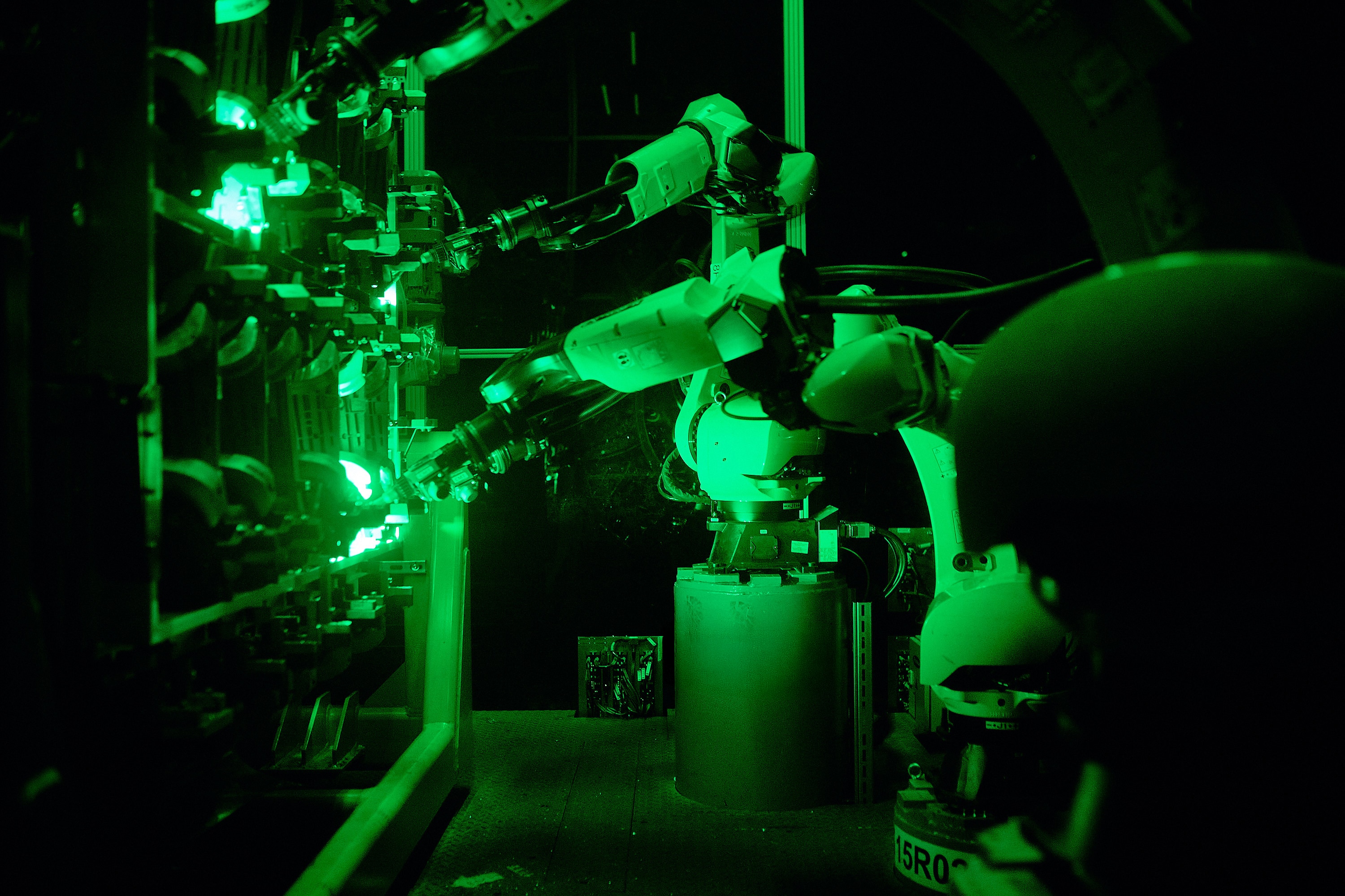 Robots assemble a battery pack at the Ford Cologne Battery Plant