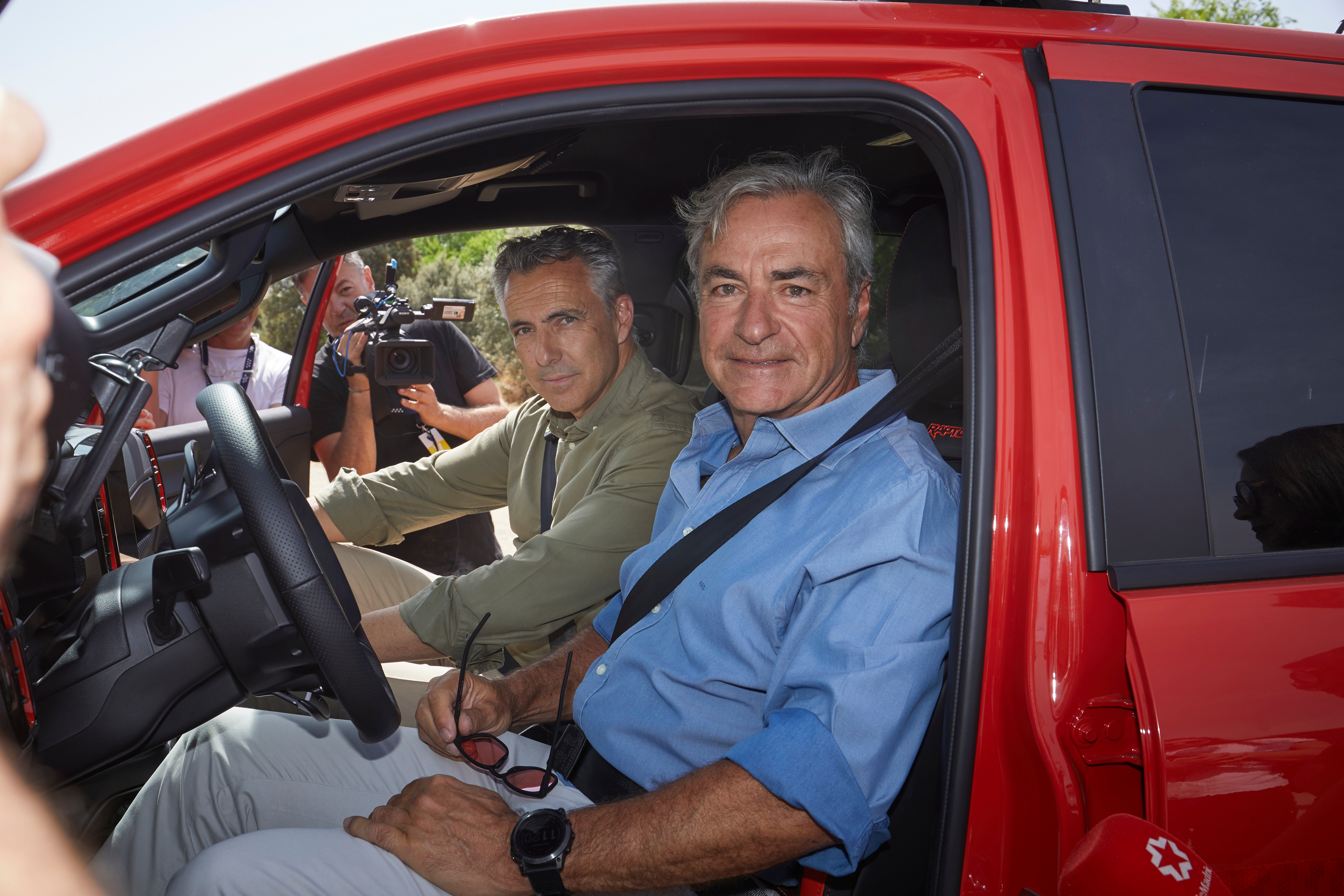 Sainz about to go for a drive with Carlos Novillo, Regional Minister of Environment, Agriculture and Interior of the community of Madrid. LICENSE EXPIRES: In perp - LICENSE BY:Ford Europe LICENSE SCOPE: A - Earned editorial, press releases, press kits. C - All non-broadcast digital and online media, plus Retail and POS (showrooms, events etc). D - All print media (newspaper, magazine etc) REGION: Global COPYRIGHT AND IMAGE RIGHTS: This content is solely for editorial use and for providing individual users with information. Any storage in databases, or any distribution to third parties within the scope of commercial use, or for commercial use is permitted with written consent from Ford of Europe only.