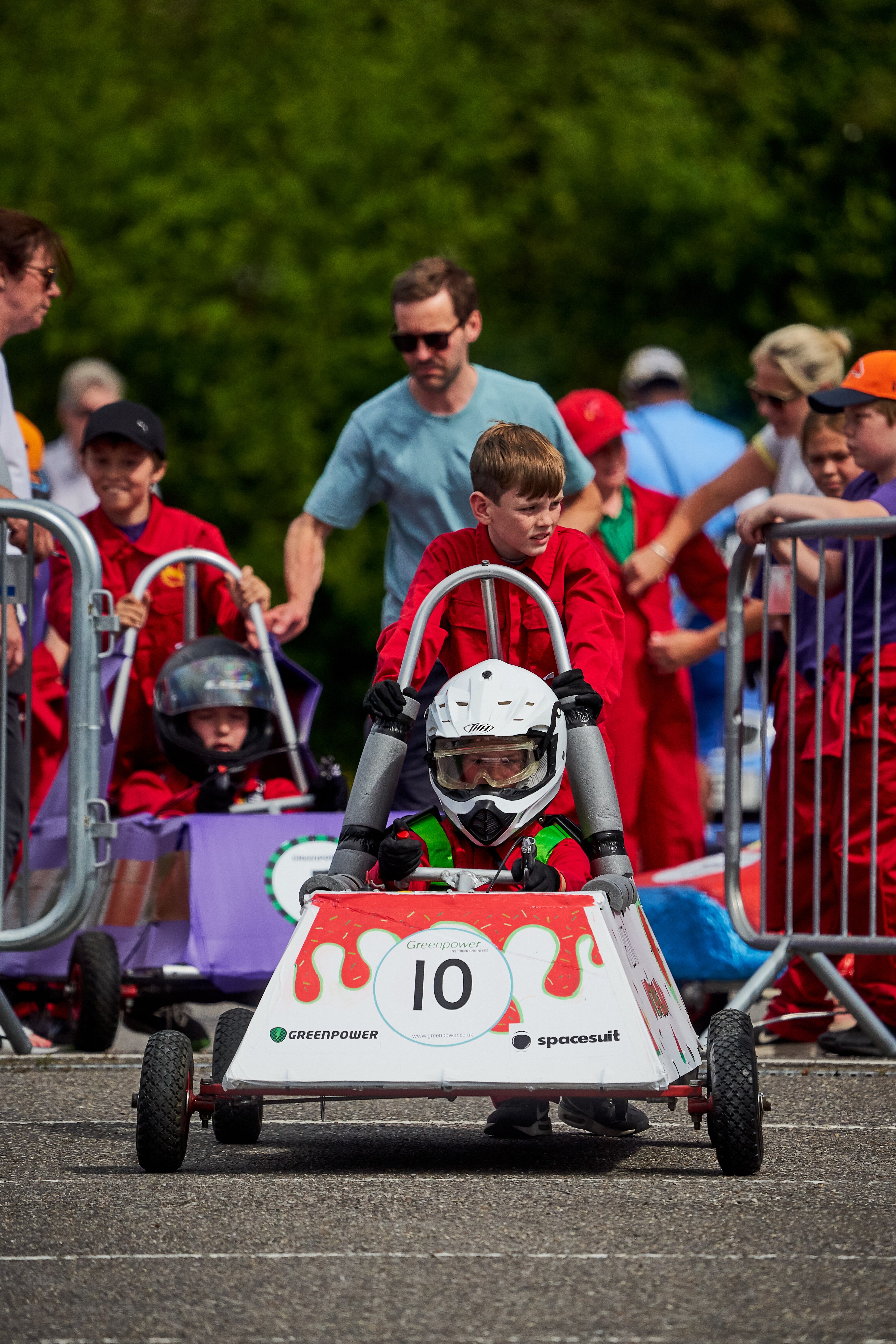 The Whizzing Watermelons prepare for the Formula Goblin start. LICENSE EXPIRES: PERPETUAL - LICENSE BY: Spacesuit Media LICENSE SCOPE: A - Earned editorial, press releases, press kits. B - All non-broadcast digital and online media. C - All non-broadcast digital and online media, plus Retail and POS (showrooms, events etc). D - All print media (newspaper, magazine etc) REGION: Global COPYRIGHT AND IMAGE RIGHTS: This content is solely for editorial use and for providing individual users with information. Any storage in databases, or any distribution to third parties within the scope of commercial use, or for commercial use is permitted with written consent from Ford of Europe only. IMAGE CREDIT: James Lynch / Spacesuit Media