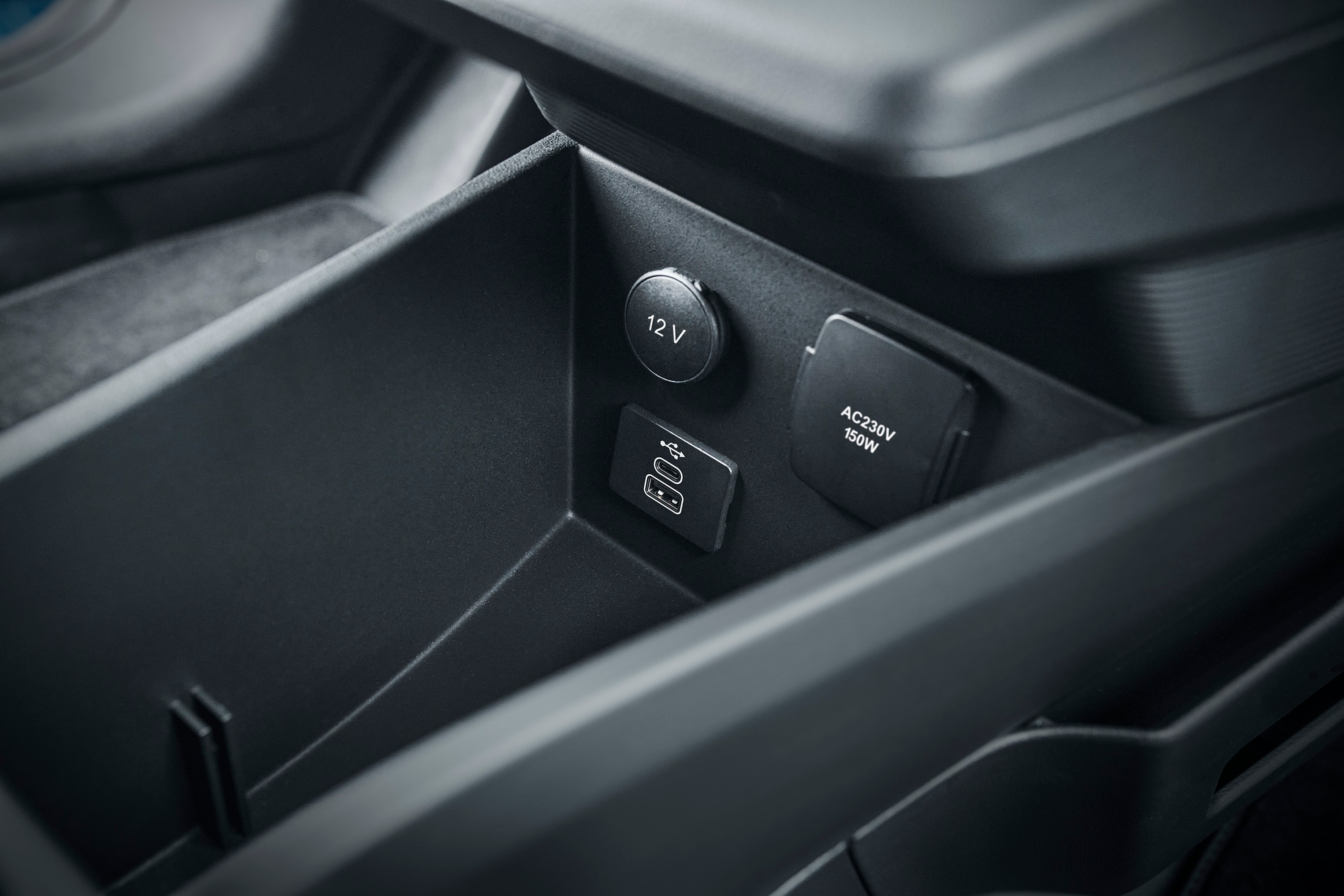 Ford E-Transit Courier interior showing Pro Power Onboard plug, 12V socket and USB-C charging point