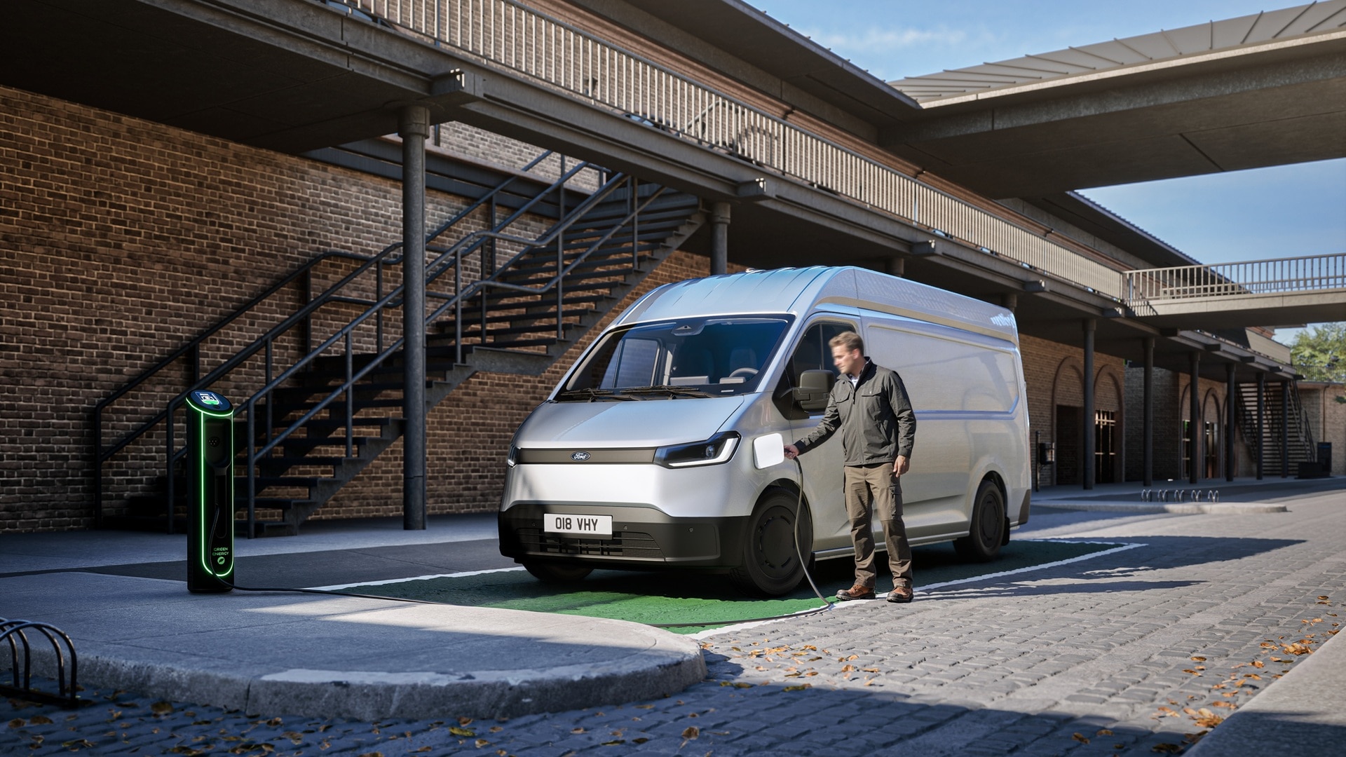 Driver charging Transit City L2H2 at public charging point