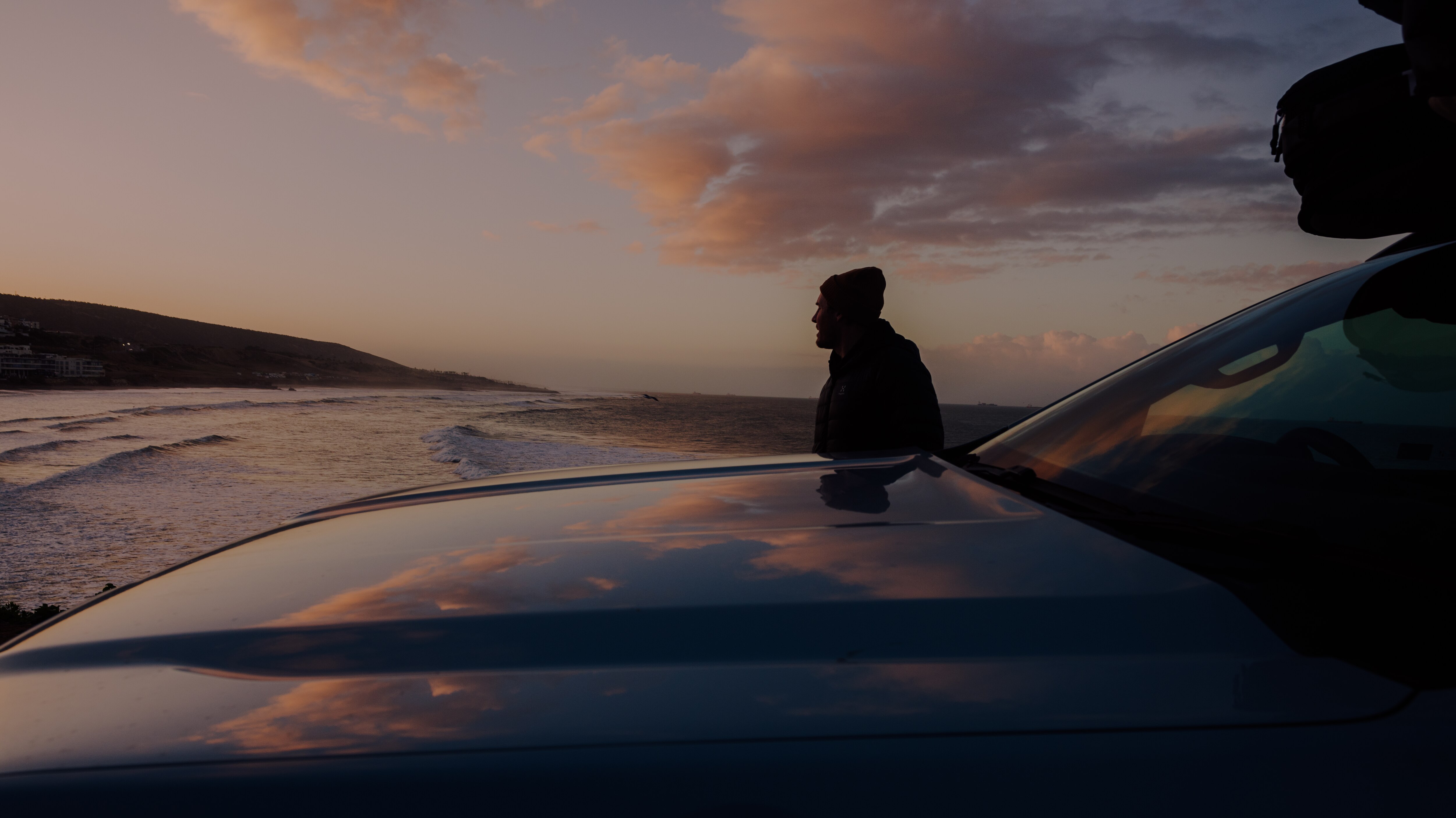 Morning clouds reflect of the Ranger PHEV's bonnet as Cotty anticipates the day. Credit: Sam Sherring