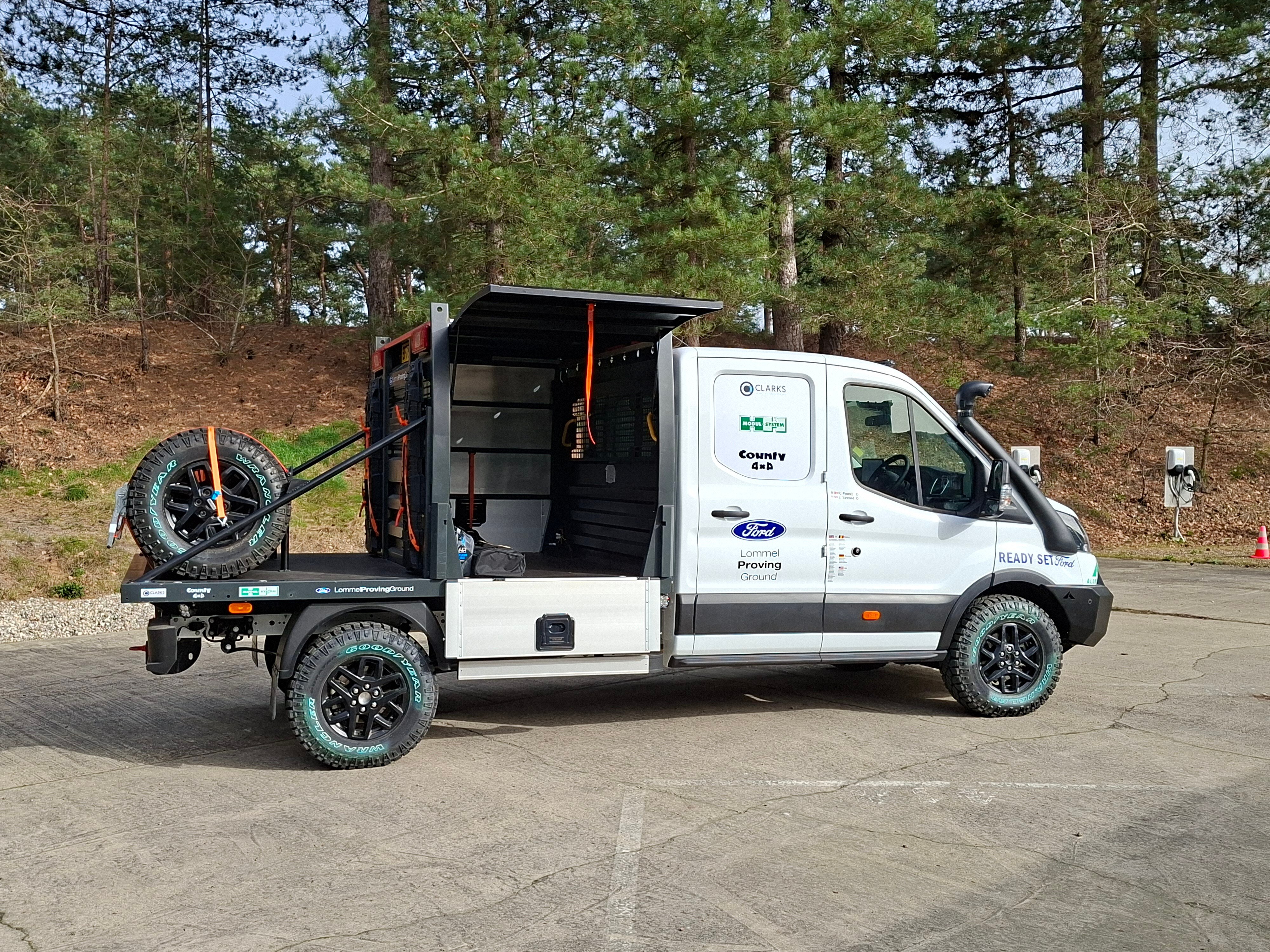 Side view of the Maroc Challenge Transit parked in Ford Lommel Proving Ground