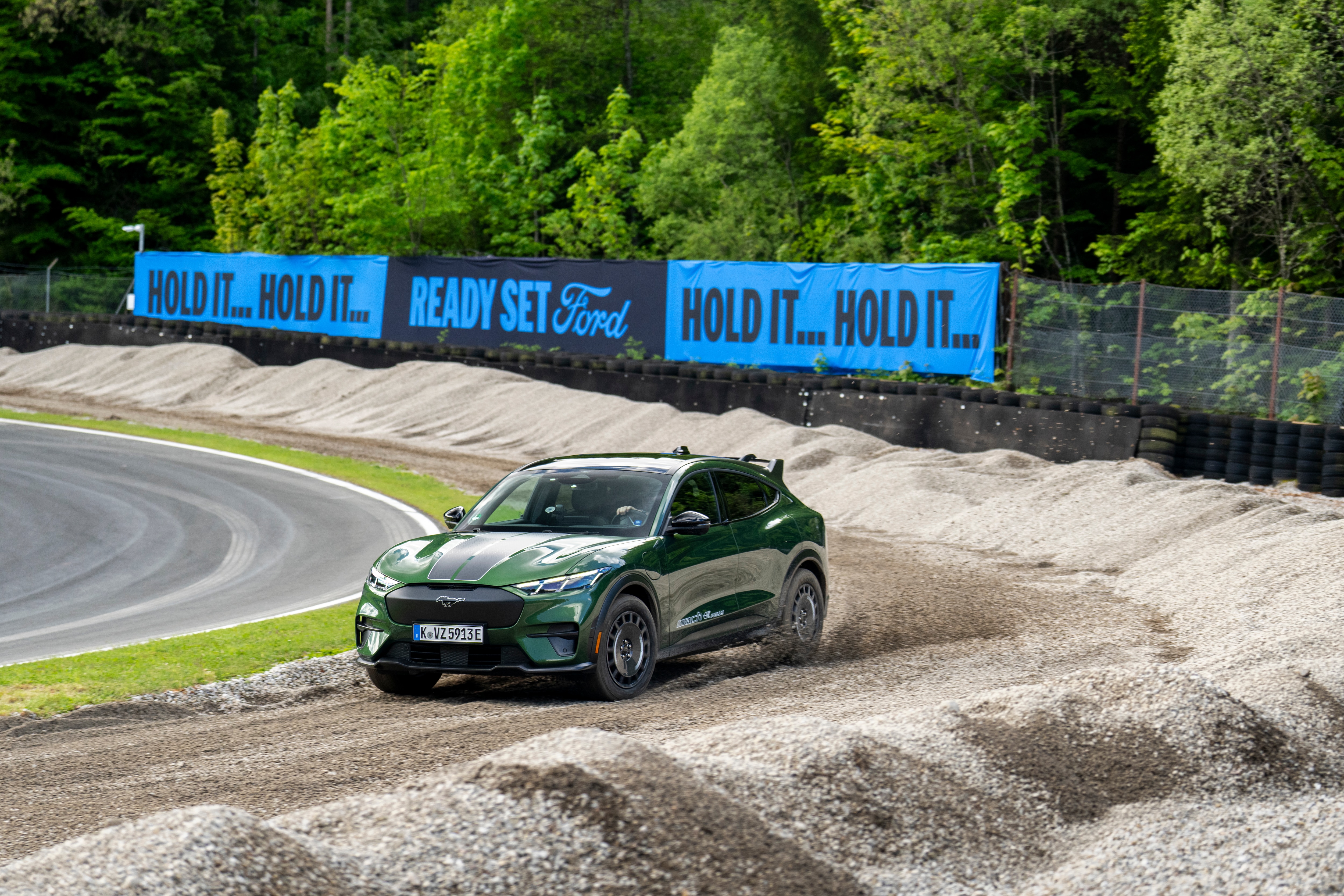 2026 Ford Mustang Mach-E Rally demonstrates its gravel surface capability at the Salzburgring, Austria.