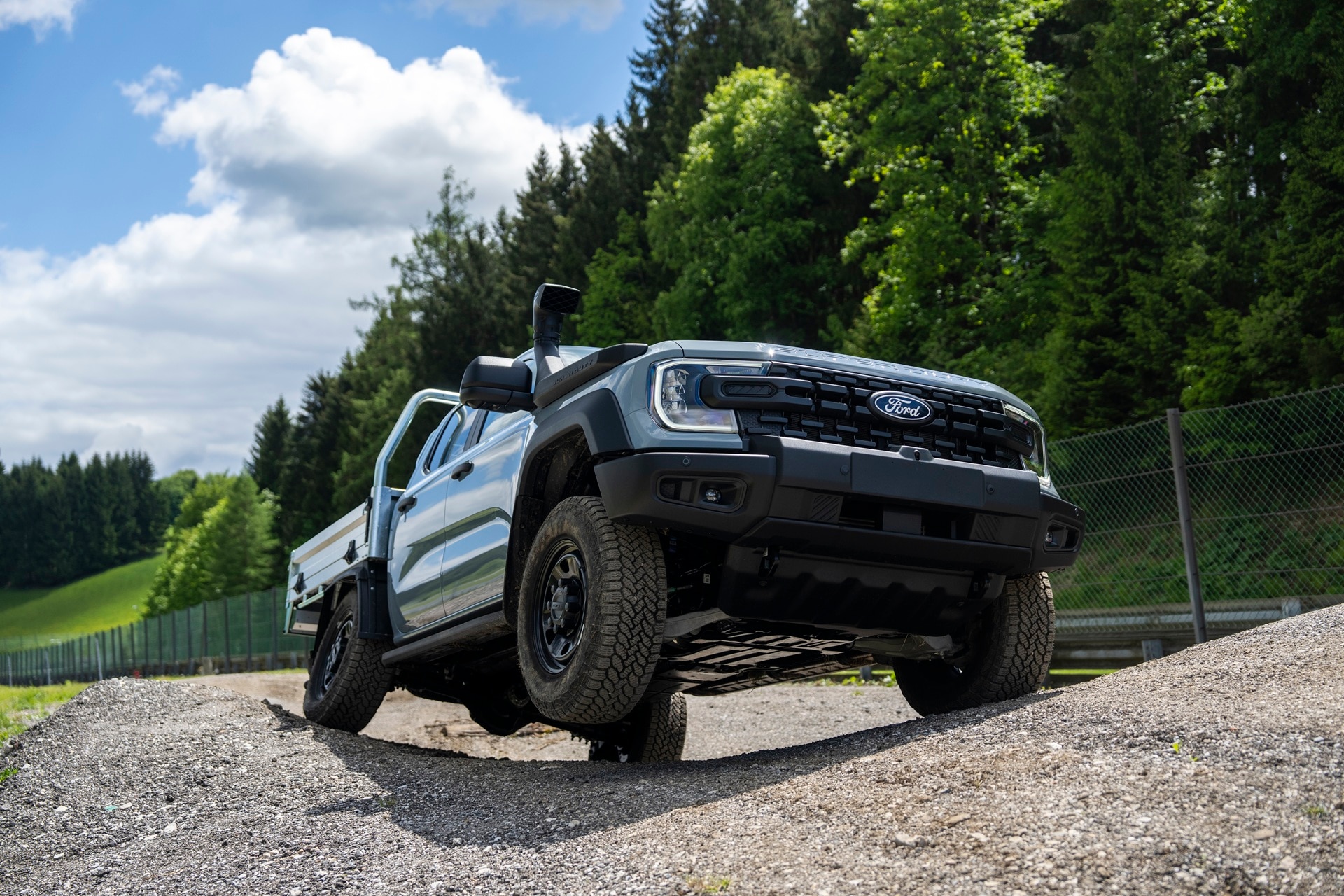 Ranger Super Duty navigating offset bumps on demanding bumpy gravel track
