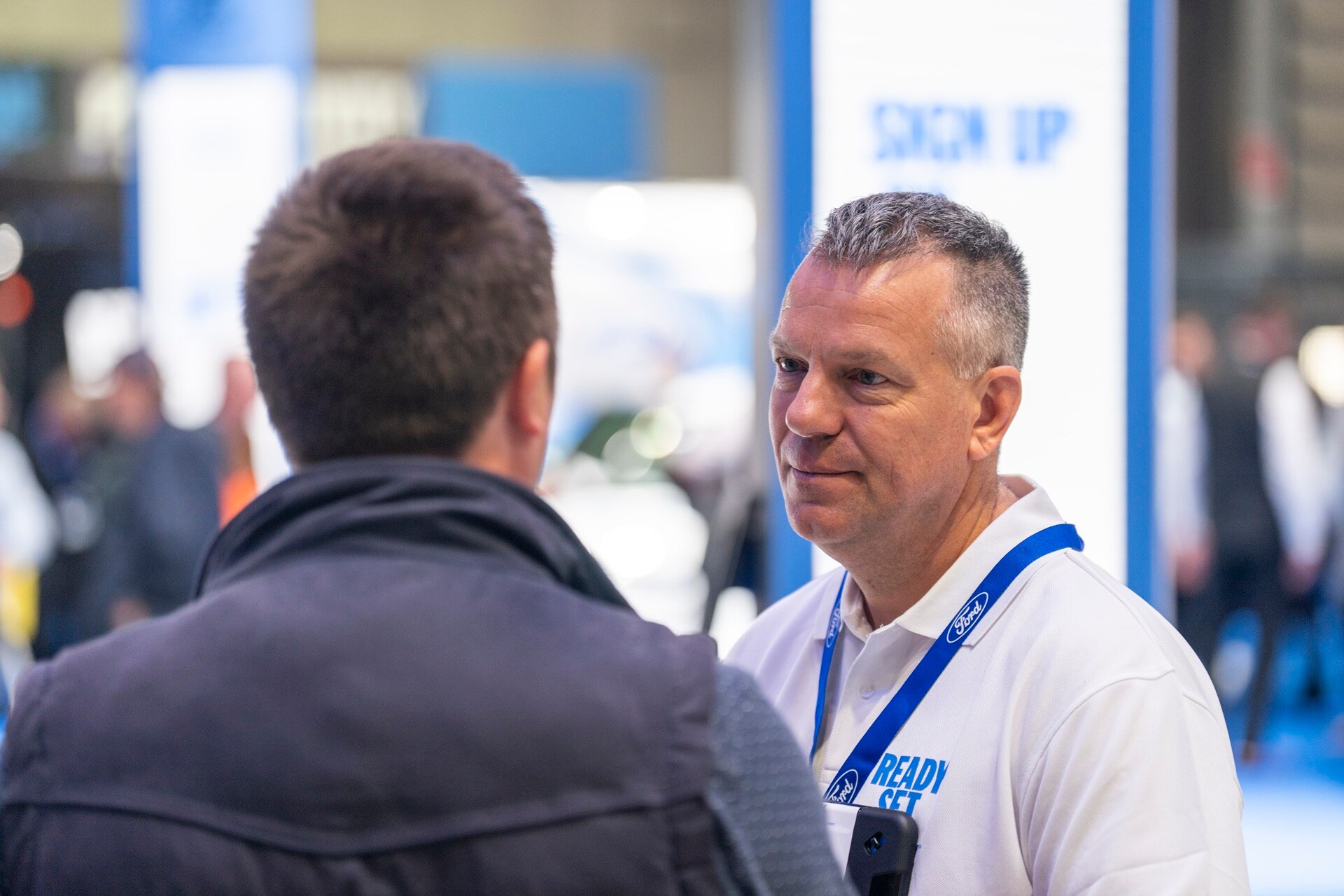 Chief programme engineer Simon Robinson talking to a guest on the Ford Pro stand