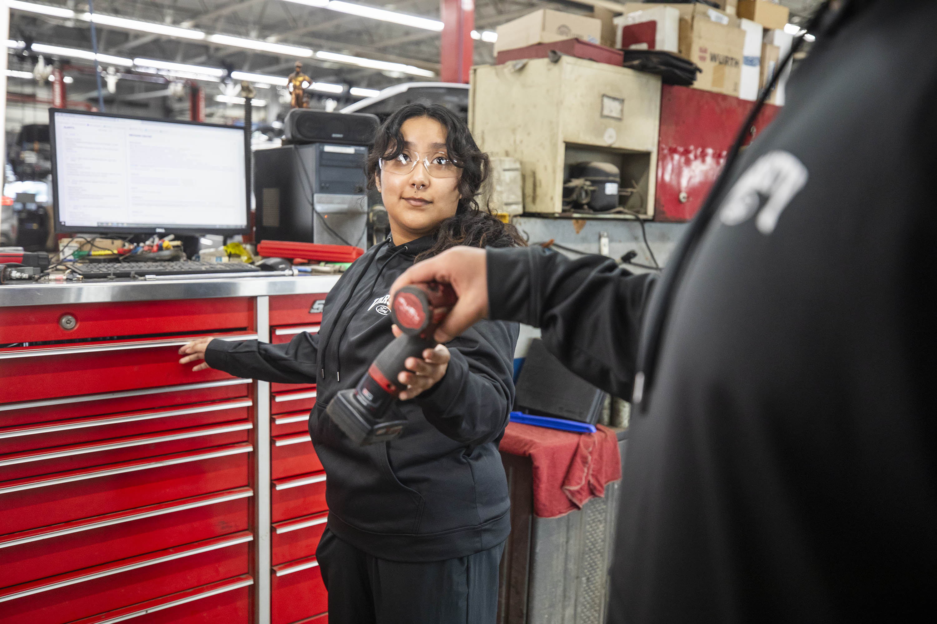 Keiry Perez-Ruiz, an auto tech scholarship recipient, at Varsity Ford in Ann Arbor, Michigan.