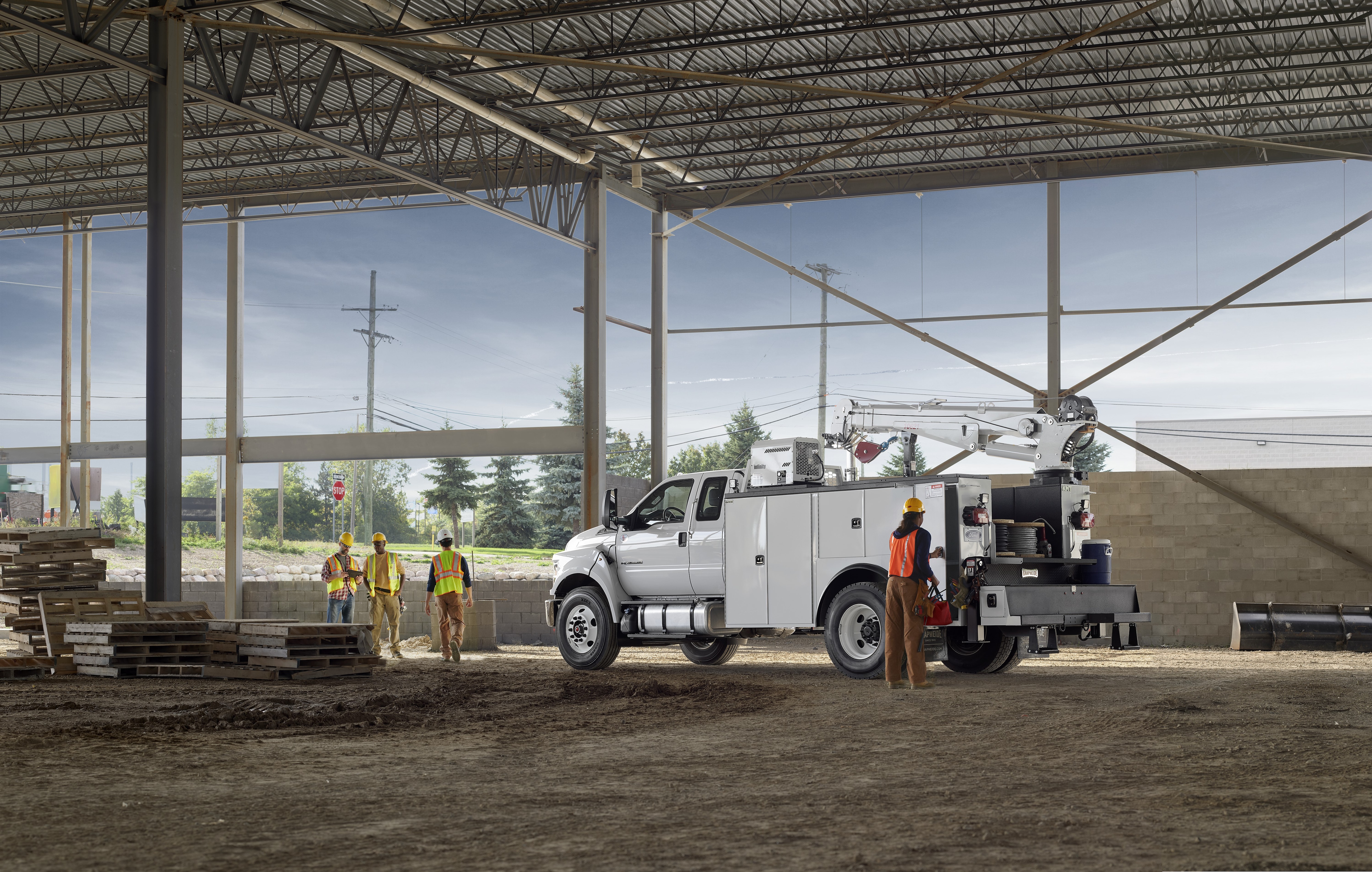 An upfitted Ford F-Series Super Duty® Chassis Cab on a work site.