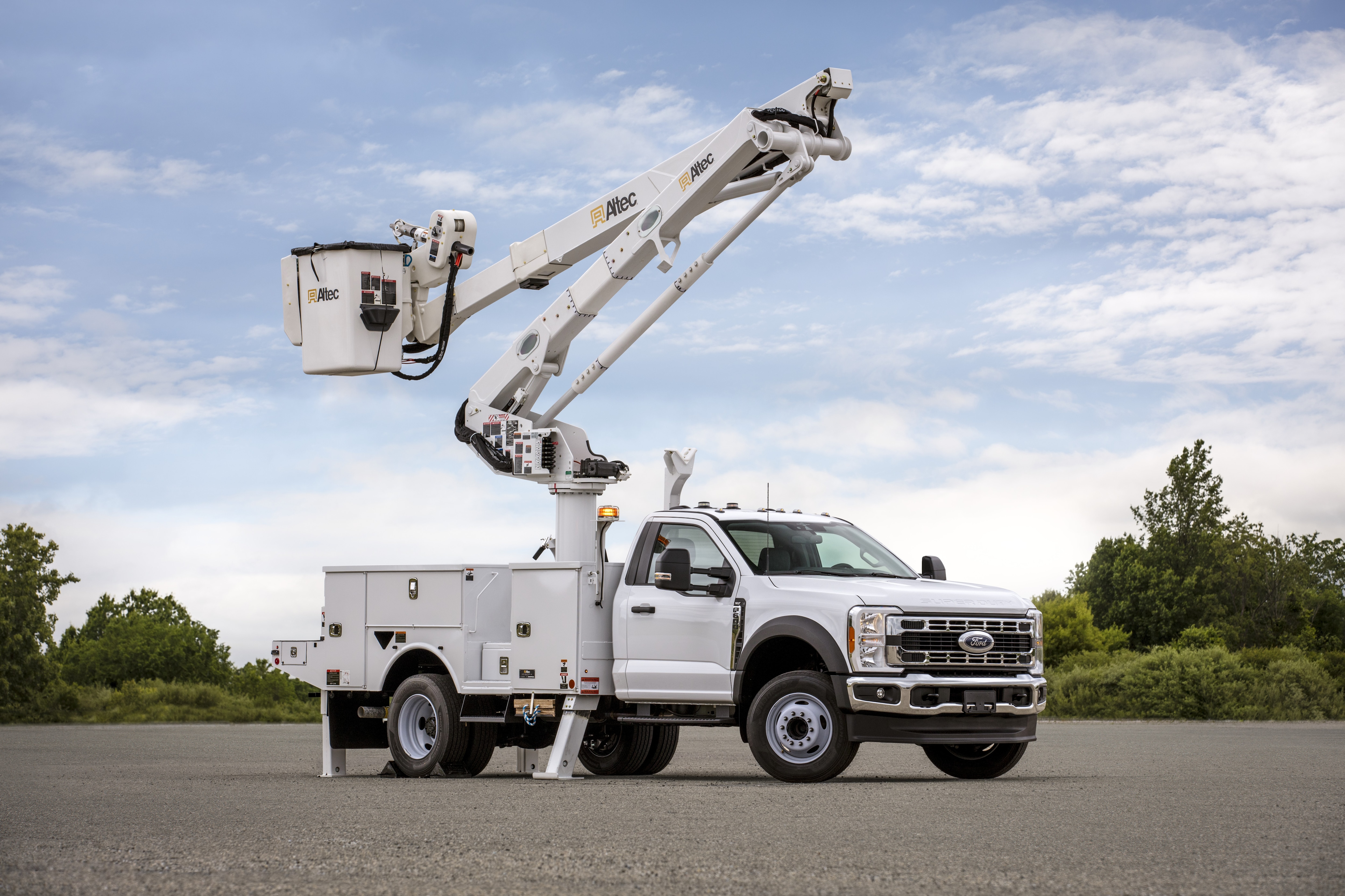 An upfitted 2025 F-600 Super Duty® Chassis Cab with a crane.