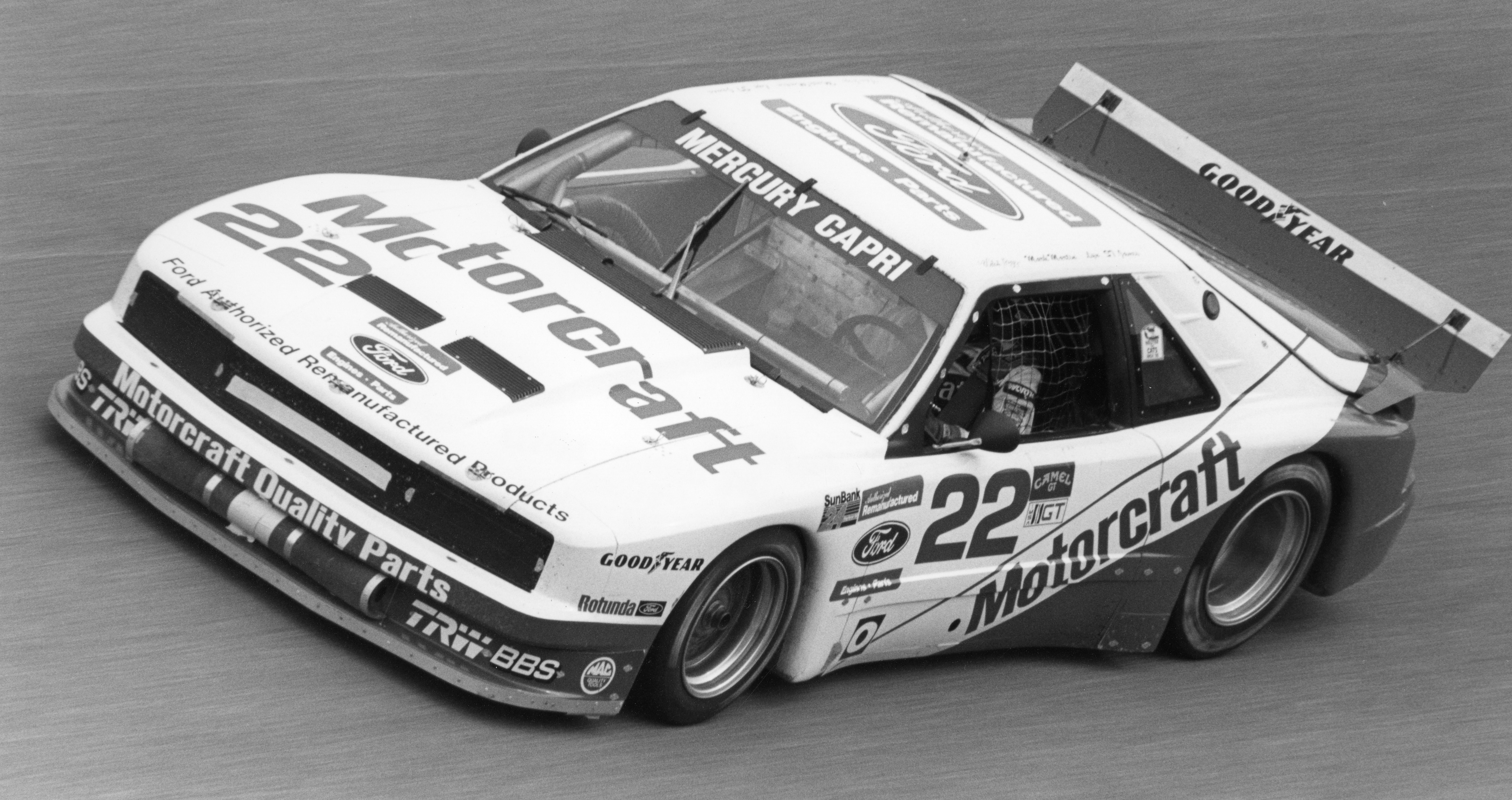 Lyn St. James racing in a Mercury Capri.