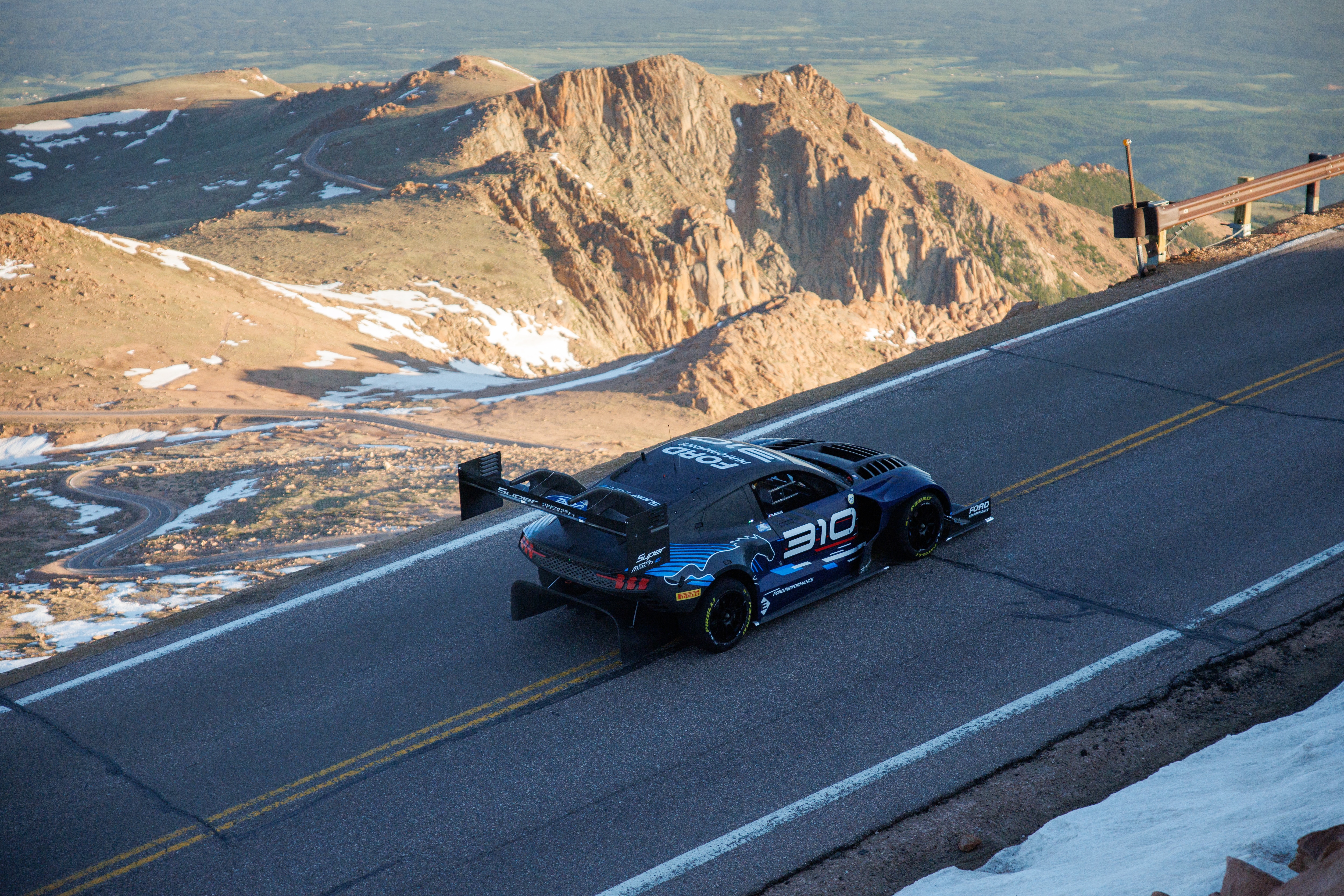 Super Mustang Mach-E electric demonstrator ascending Pikes Peak.