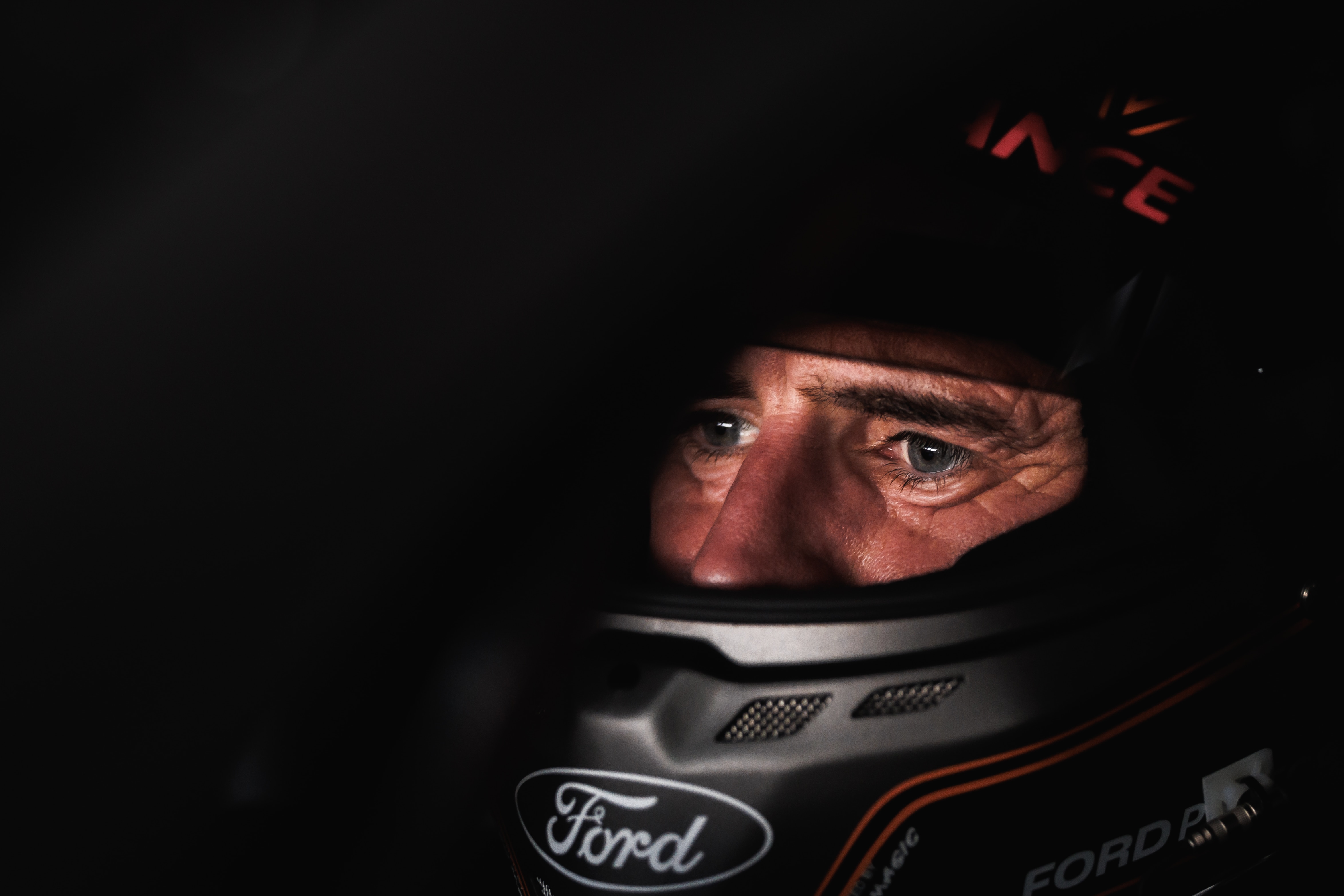 Romain Dumas in his carbon fiber racing helmet.