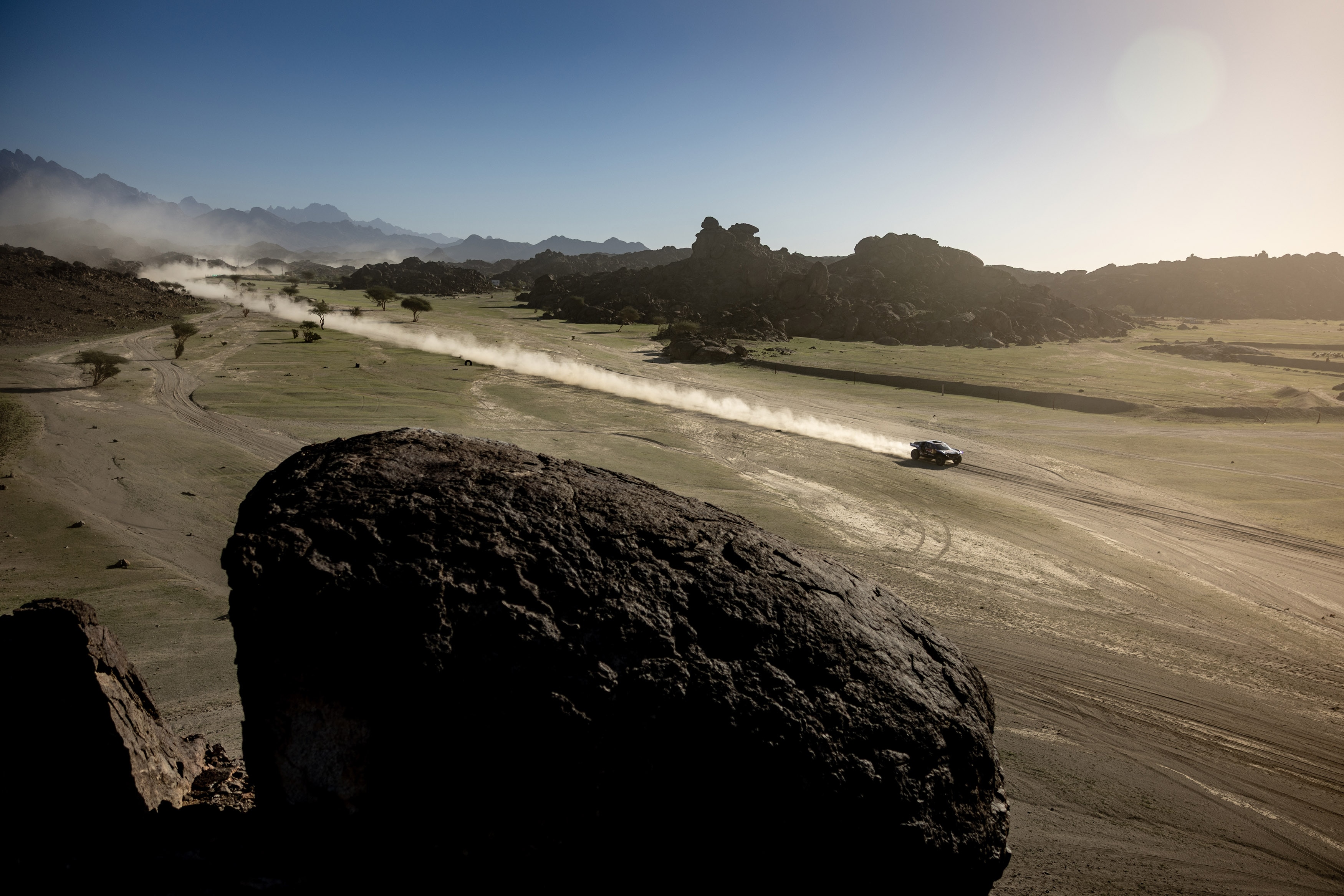 The Ford Raptor T1+ zooms through the open desert space at Dakar.