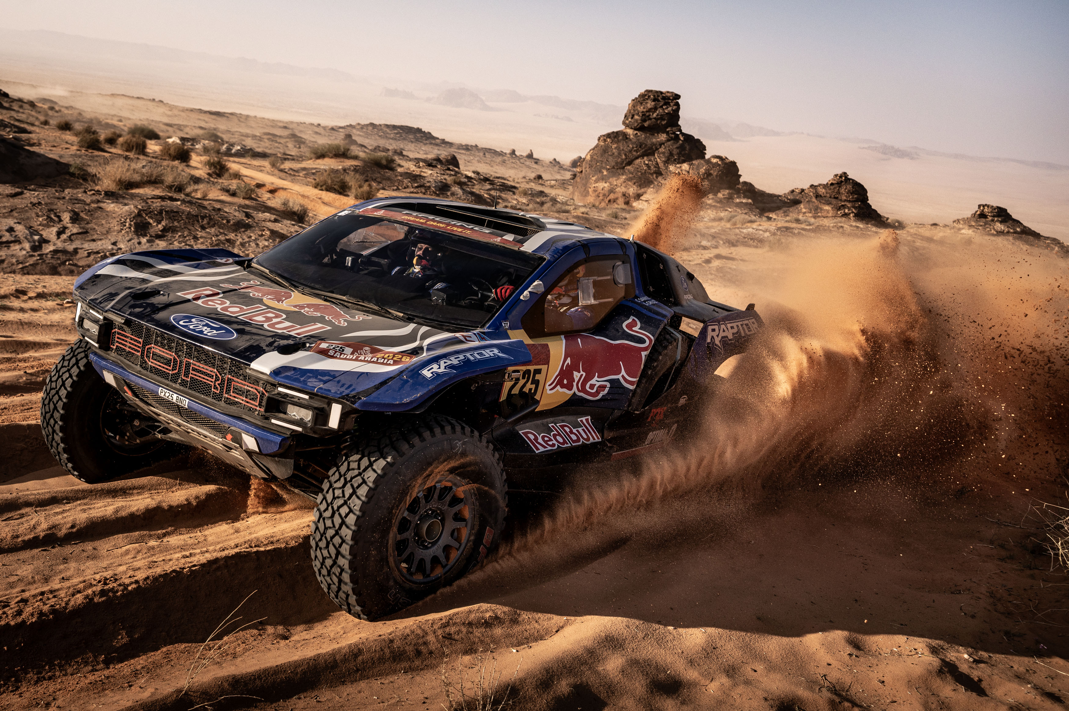 Carlos Sainz and the Raptor T1+ during Stage 5 of the 2026 Dakar Rally.